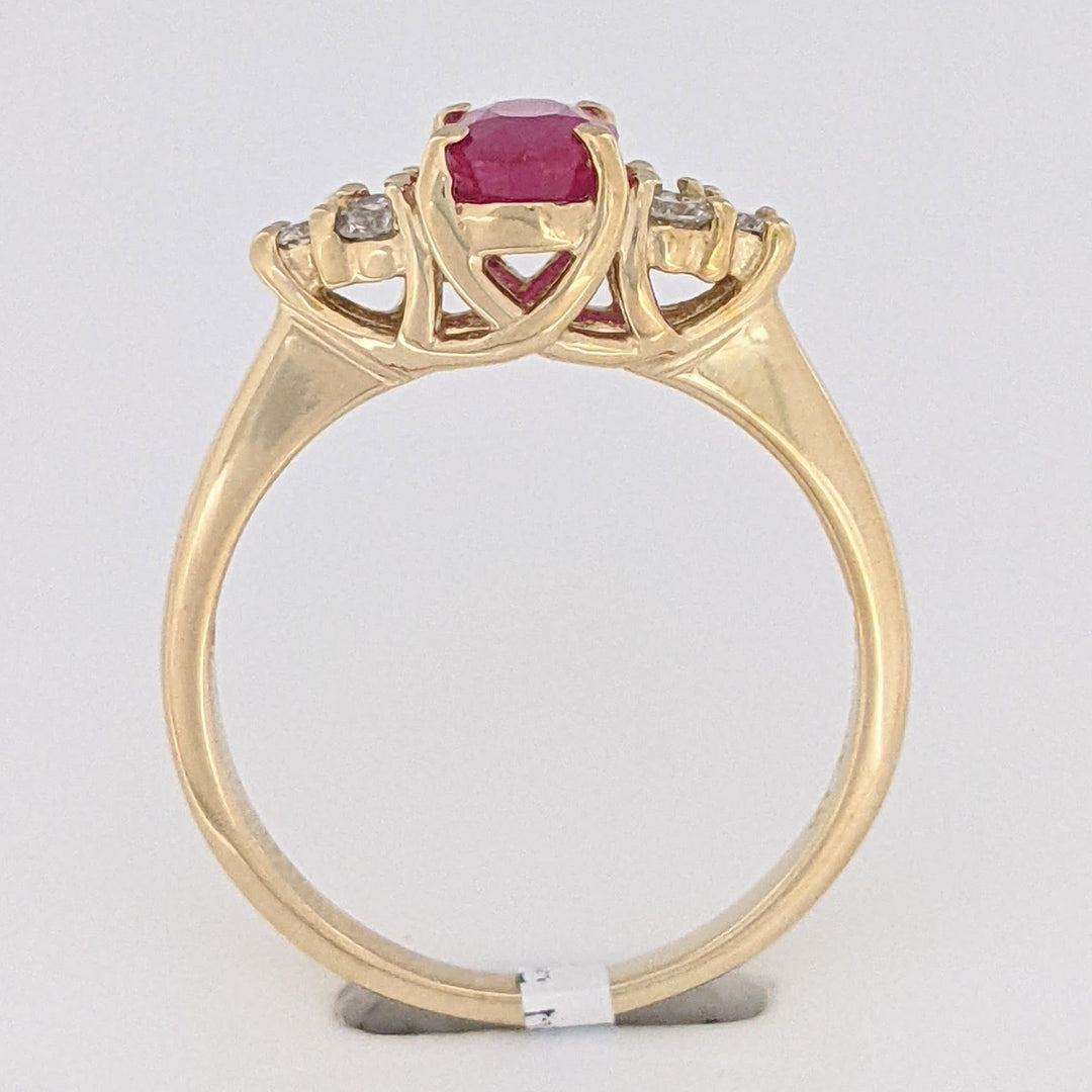 14K RUBY OVAL "A" 5X7 WITH .18 DIAMOND TOTAL WEIGHT (6) ROUND ESTATE RING 3.4 GRAMS