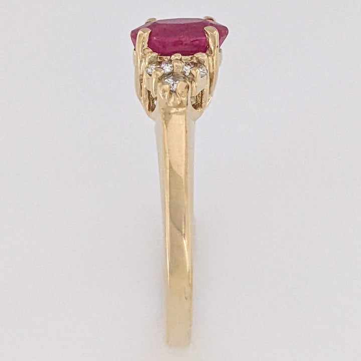 14K RUBY OVAL "A" 5X7 WITH .18 DIAMOND TOTAL WEIGHT (6) ROUND ESTATE RING 3.4 GRAMS