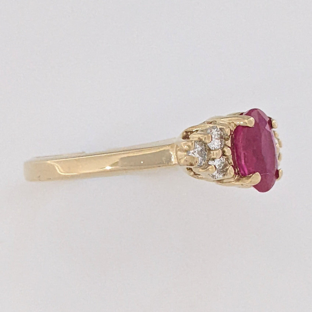 14K RUBY OVAL "A" 5X7 WITH .18 DIAMOND TOTAL WEIGHT (6) ROUND ESTATE RING 3.4 GRAMS