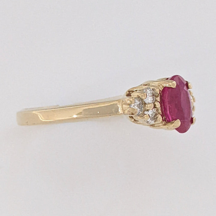 14K RUBY OVAL "A" 5X7 WITH .18 DIAMOND TOTAL WEIGHT (6) ROUND ESTATE RING 3.4 GRAMS
