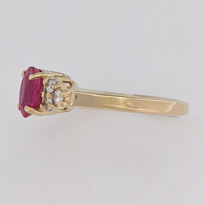 14K RUBY OVAL "A" 5X7 WITH .18 DIAMOND TOTAL WEIGHT (6) ROUND ESTATE RING 3.4 GRAMS