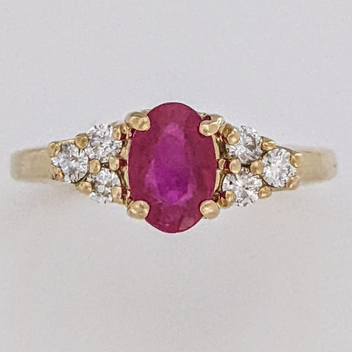 14K RUBY OVAL "A" 5X7 WITH .18 DIAMOND TOTAL WEIGHT (6) ROUND ESTATE RING 3.4 GRAMS