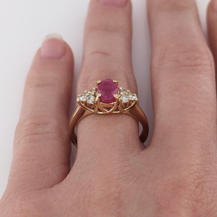 14K RUBY OVAL "A" 5X7 WITH .18 DIAMOND TOTAL WEIGHT (6) ROUND ESTATE RING 3.4 GRAMS