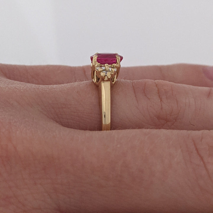 14K RUBY OVAL "A" 5X7 WITH .18 DIAMOND TOTAL WEIGHT (6) ROUND ESTATE RING 3.4 GRAMS