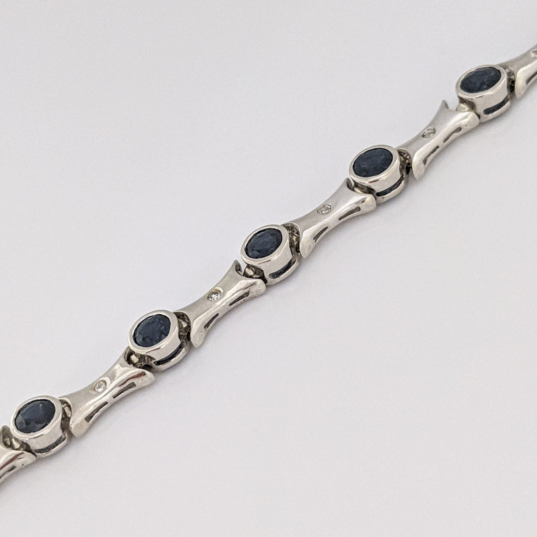 14K WHITE SAPPHIRE ROUND (14) 4MM BEZEL WITH .13 DIAMOND TOTAL WEIGHT ESTATE BRACELET 12.7 GRAMS