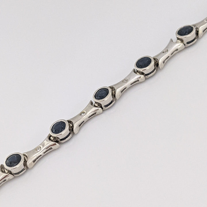 14K WHITE SAPPHIRE ROUND (14) 4MM BEZEL WITH .13 DIAMOND TOTAL WEIGHT ESTATE BRACELET 12.7 GRAMS