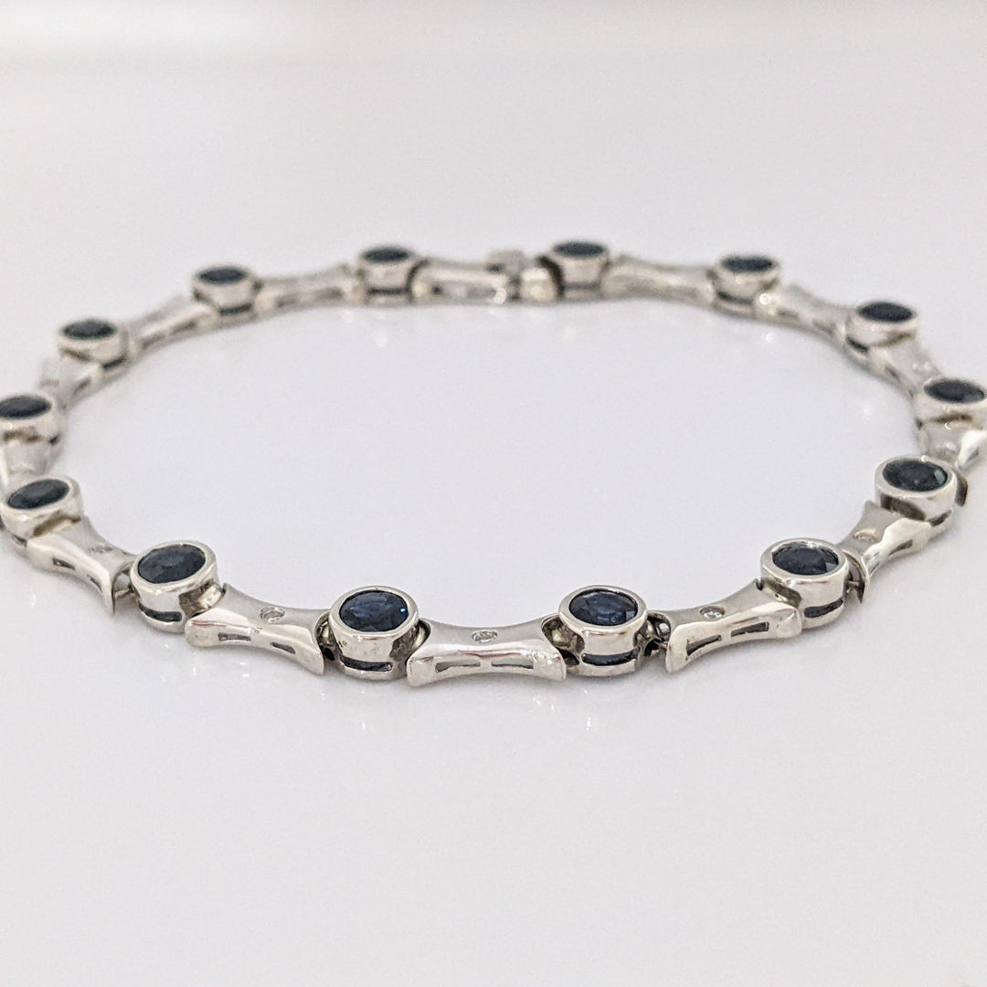 14K WHITE SAPPHIRE ROUND (14) 4MM BEZEL WITH .13 DIAMOND TOTAL WEIGHT ESTATE BRACELET 12.7 GRAMS