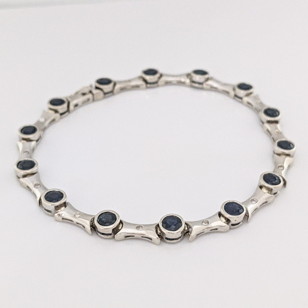 14K WHITE SAPPHIRE ROUND (14) 4MM BEZEL WITH .13 DIAMOND TOTAL WEIGHT ESTATE BRACELET 12.7 GRAMS