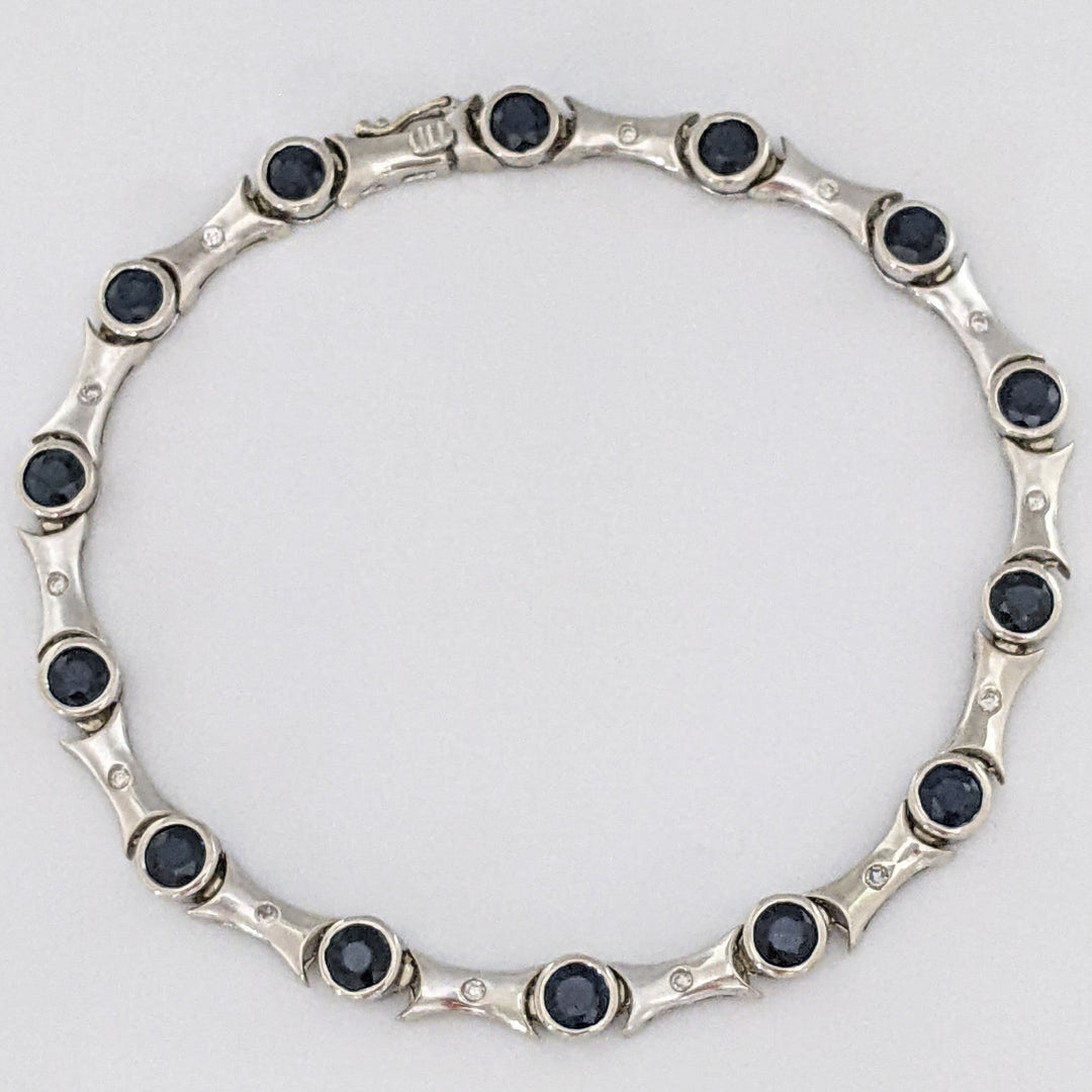 14K WHITE SAPPHIRE ROUND (14) 4MM BEZEL WITH .13 DIAMOND TOTAL WEIGHT ESTATE BRACELET 12.7 GRAMS