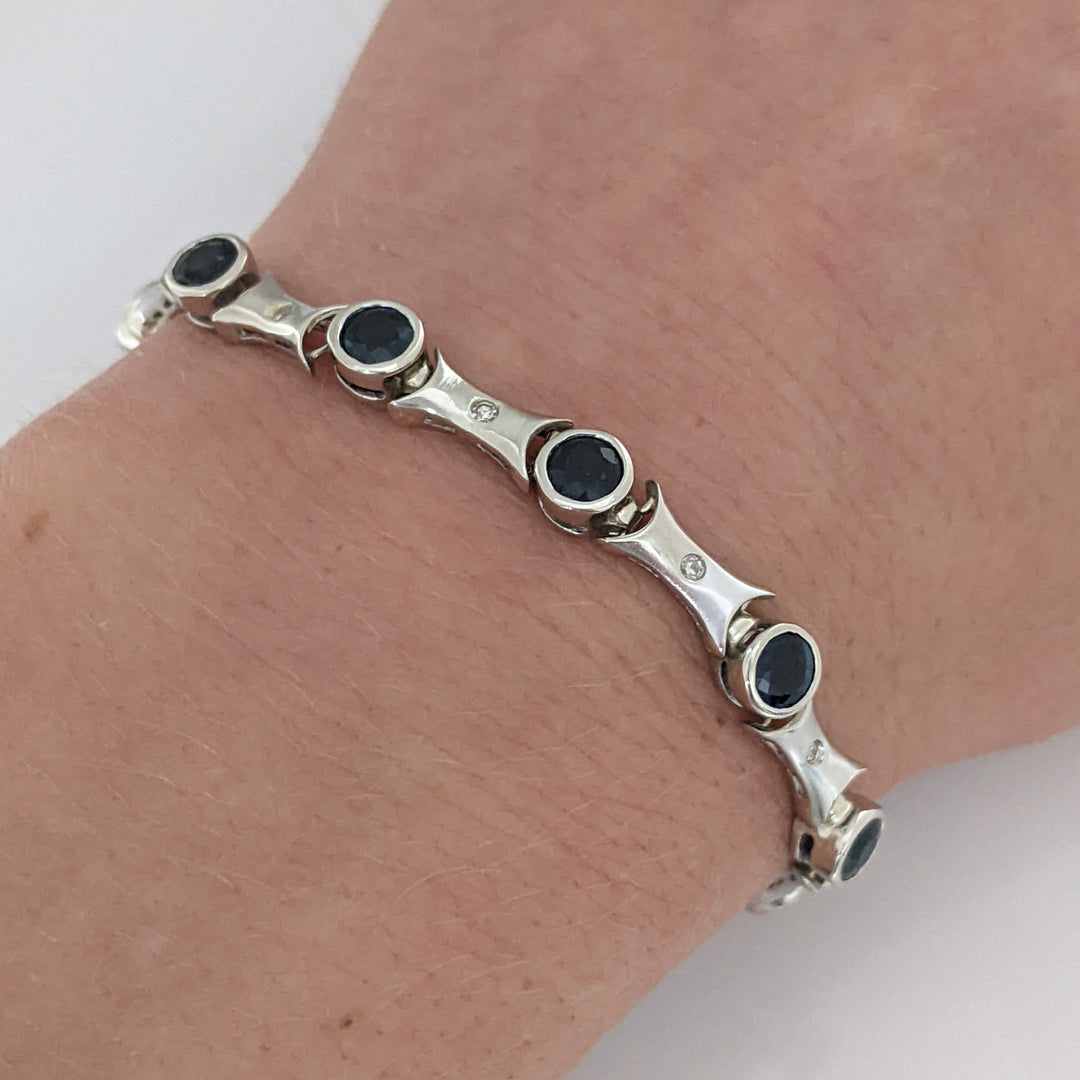 14K WHITE SAPPHIRE ROUND (14) 4MM BEZEL WITH .13 DIAMOND TOTAL WEIGHT ESTATE BRACELET 12.7 GRAMS