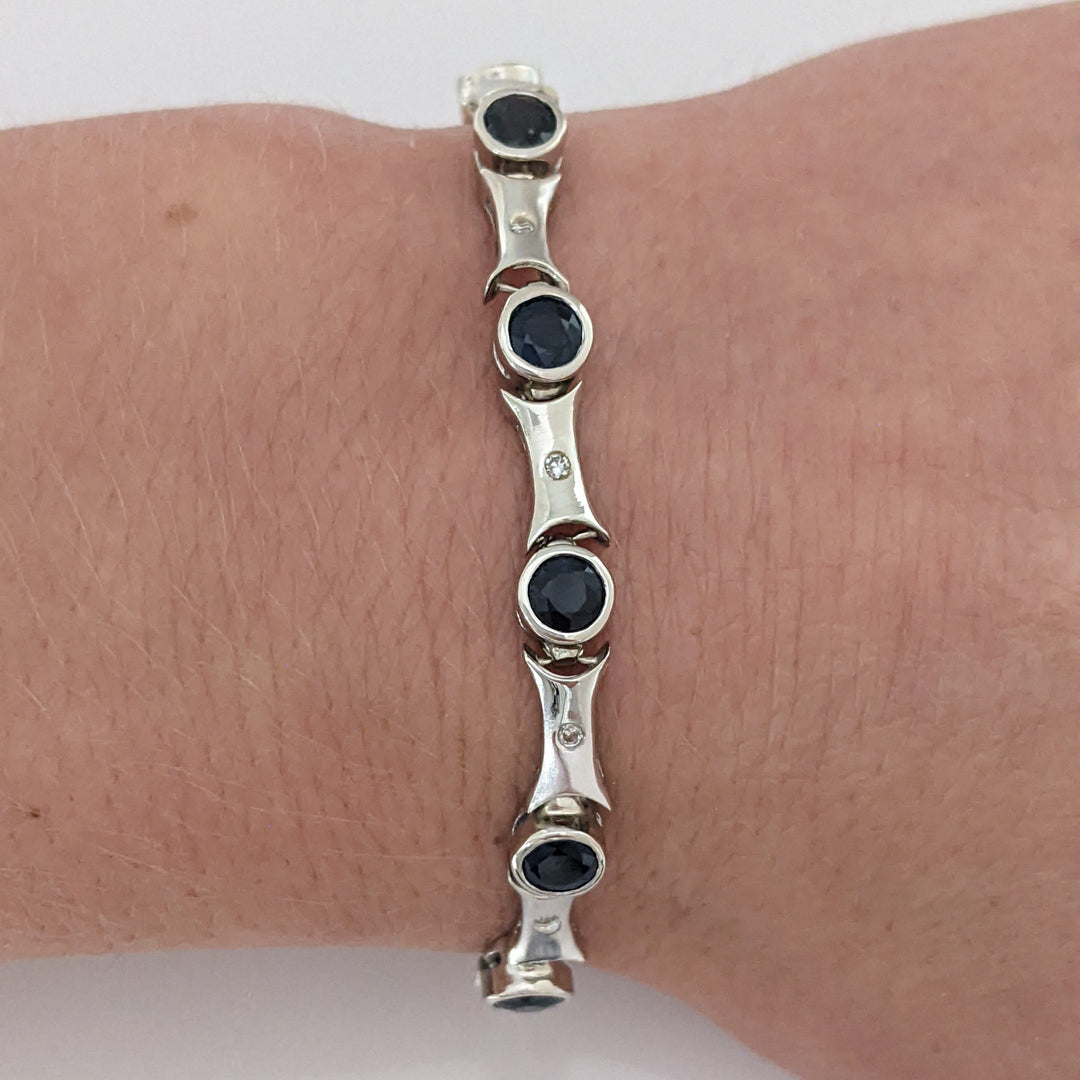 14K WHITE SAPPHIRE ROUND (14) 4MM BEZEL WITH .13 DIAMOND TOTAL WEIGHT ESTATE BRACELET 12.7 GRAMS