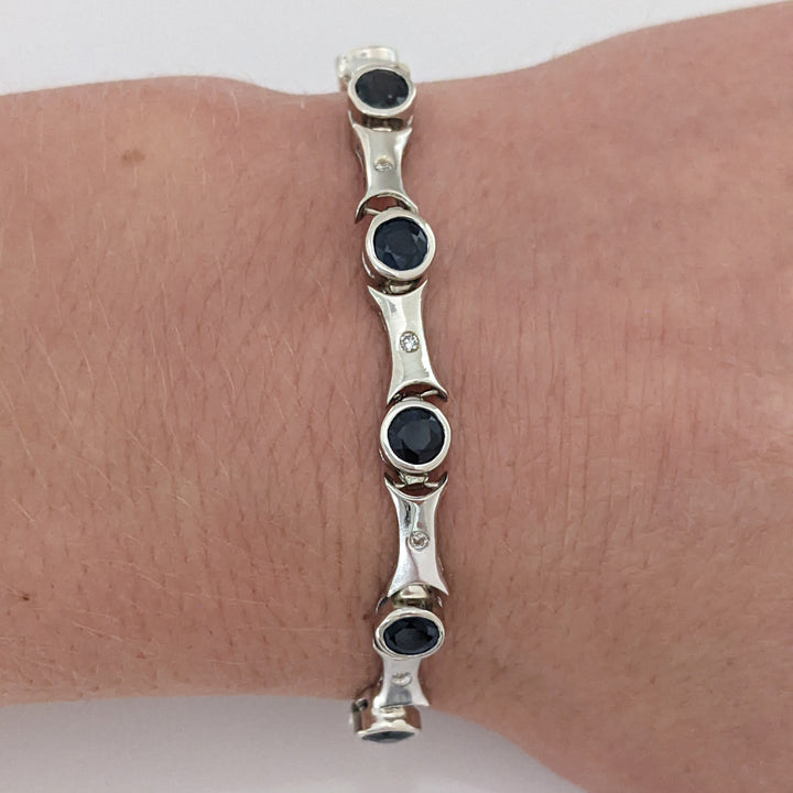 14K WHITE SAPPHIRE ROUND (14) 4MM BEZEL WITH .13 DIAMOND TOTAL WEIGHT ESTATE BRACELET 12.7 GRAMS