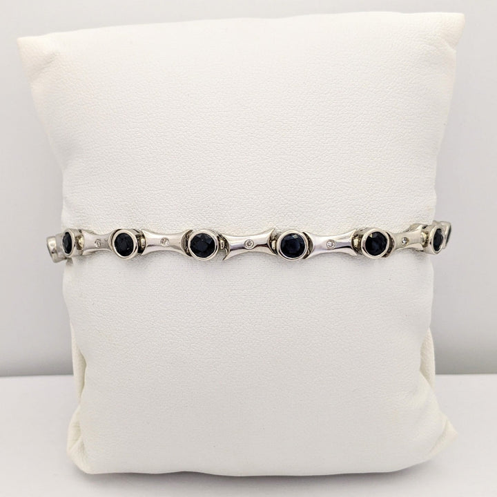 14K WHITE SAPPHIRE ROUND (14) 4MM BEZEL WITH .13 DIAMOND TOTAL WEIGHT ESTATE BRACELET 12.7 GRAMS