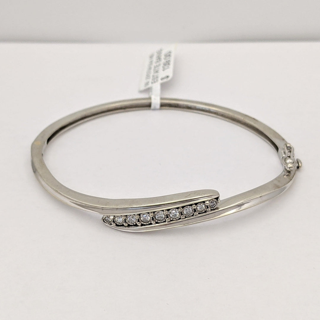 STERLING SILVER .27 CARAT TOTAL WEIGHT DIAMOND ROUND (9) ESTATE BYPASS BANGLE 12.2 GRAMS