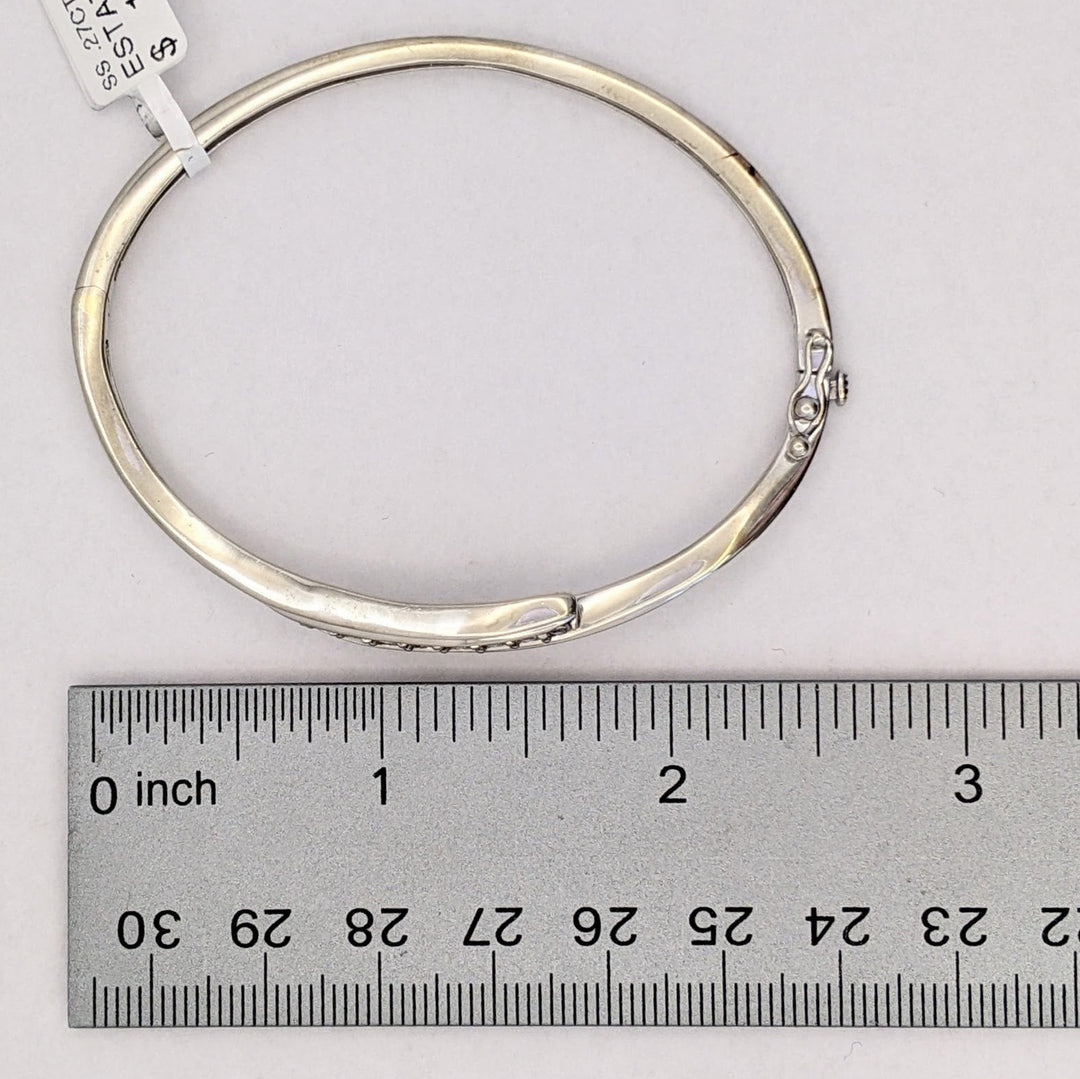 STERLING SILVER .27 CARAT TOTAL WEIGHT DIAMOND ROUND (9) ESTATE BYPASS BANGLE 12.2 GRAMS