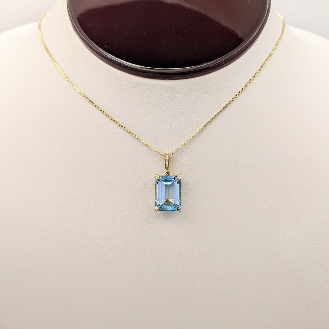 10K BLUE TOPAZ EMERALD CUT 10X14 WITH (5) MELEE ESTATE PENDANT & 14K CHAIN 5.3 GRAMS