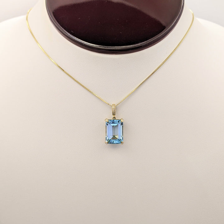 10K BLUE TOPAZ EMERALD CUT 10X14 WITH (5) MELEE ESTATE PENDANT & 14K CHAIN 5.3 GRAMS