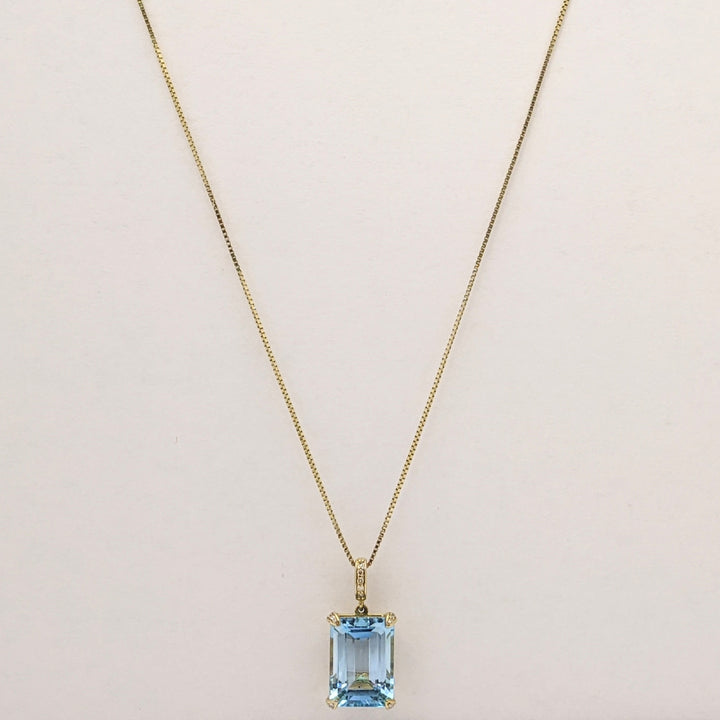 10K BLUE TOPAZ EMERALD CUT 10X14 WITH (5) MELEE ESTATE PENDANT & 14K CHAIN 5.3 GRAMS