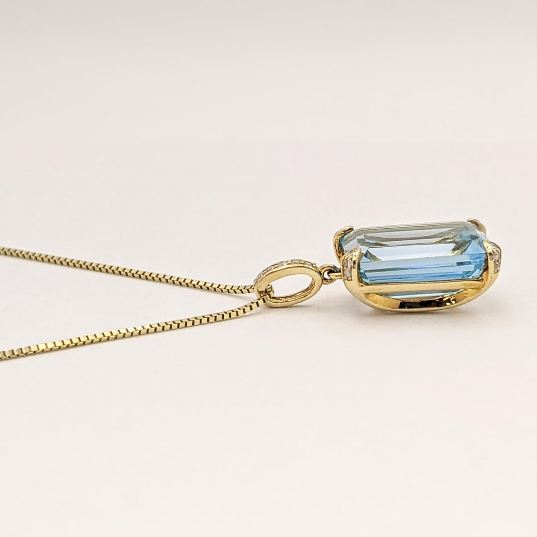 10K BLUE TOPAZ EMERALD CUT 10X14 WITH (5) MELEE ESTATE PENDANT & 14K CHAIN 5.3 GRAMS