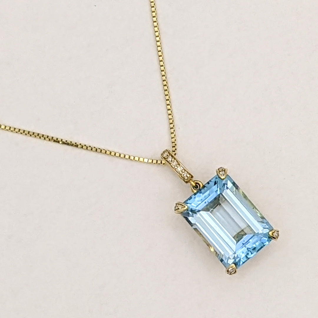 10K BLUE TOPAZ EMERALD CUT 10X14 WITH (5) MELEE ESTATE PENDANT & 14K CHAIN 5.3 GRAMS