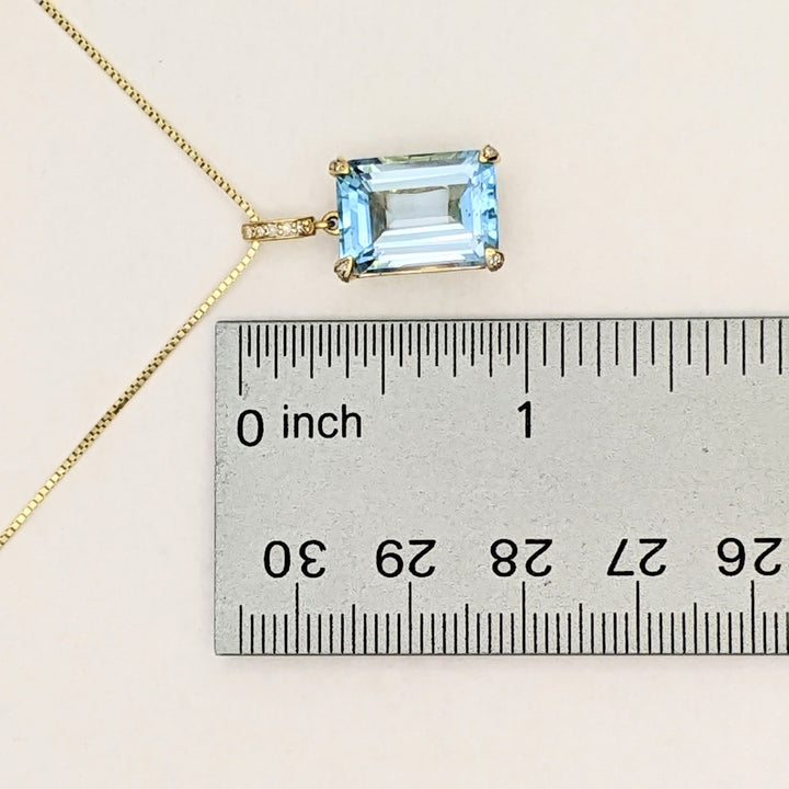 10K BLUE TOPAZ EMERALD CUT 10X14 WITH (5) MELEE ESTATE PENDANT & 14K CHAIN 5.3 GRAMS