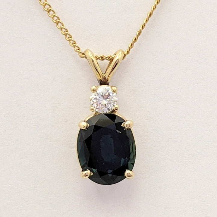 14K SAPPHIRE OVAL 8X10 WITH .25 DIAMOND TOTAL WEIGHT (1) ROUND ESTATE PENDANT & CHAIN 3.3 GRAMS