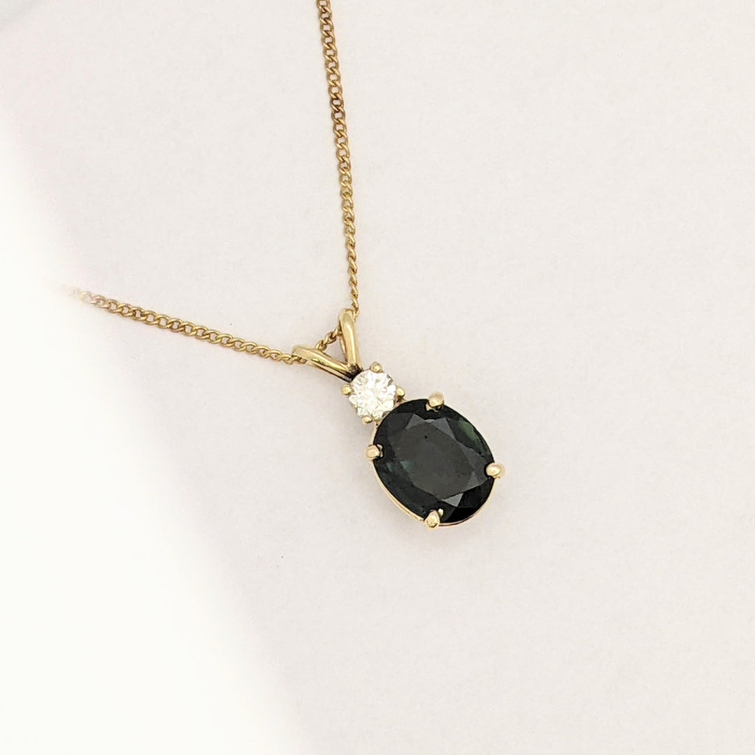14K SAPPHIRE OVAL 8X10 WITH .25 DIAMOND TOTAL WEIGHT (1) ROUND ESTATE PENDANT & CHAIN 3.3 GRAMS