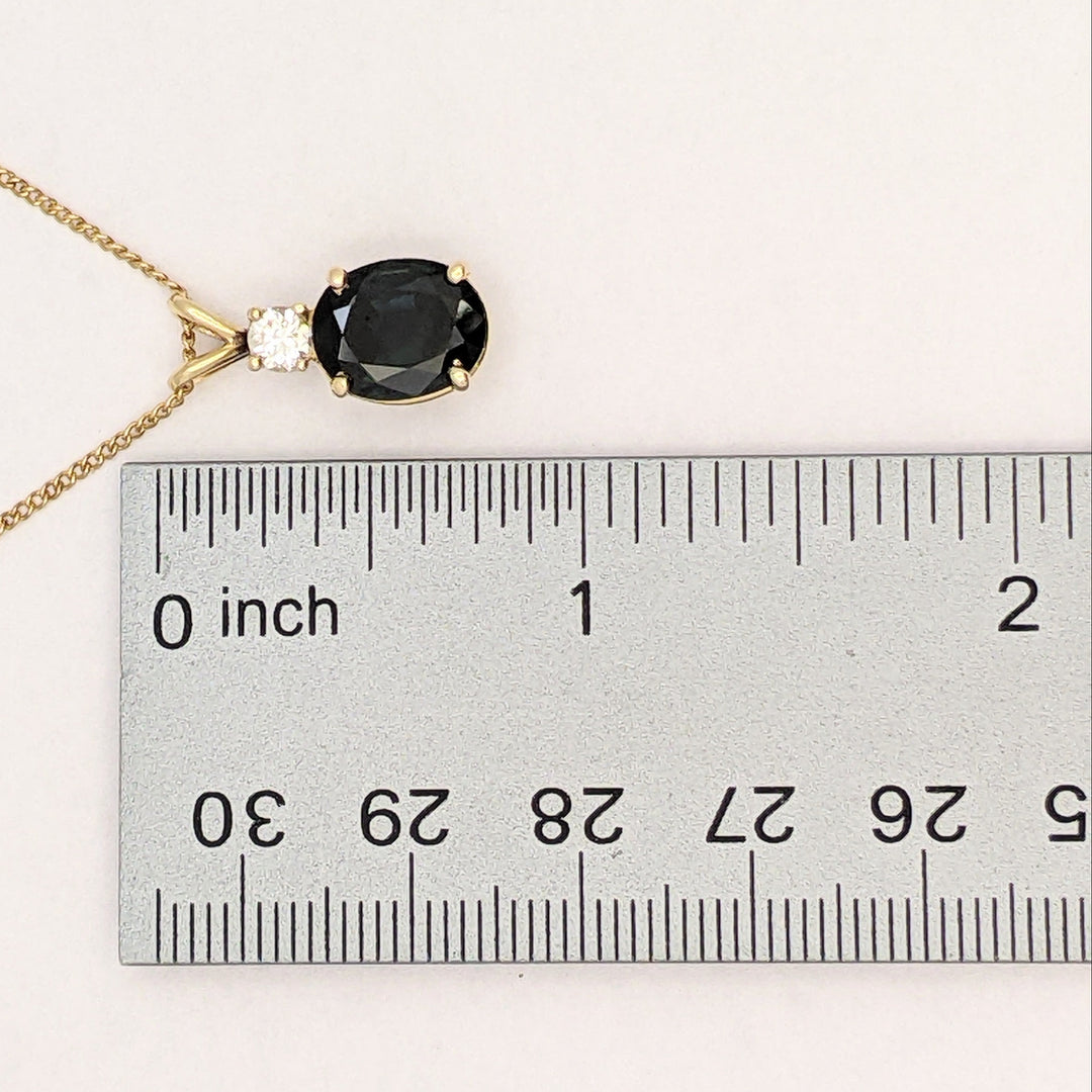 14K SAPPHIRE OVAL 8X10 WITH .25 DIAMOND TOTAL WEIGHT (1) ROUND ESTATE PENDANT & CHAIN 3.3 GRAMS