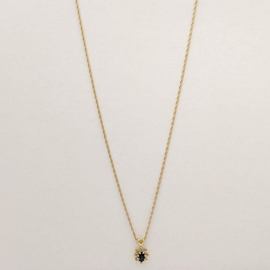 14K SAPPHIRE OVAL 3X5 WITH .12 DIAMOND TOTAL WEIGHT (8) ROUND ESTATE PENDANT & CHAIN 2.1 GRAMS