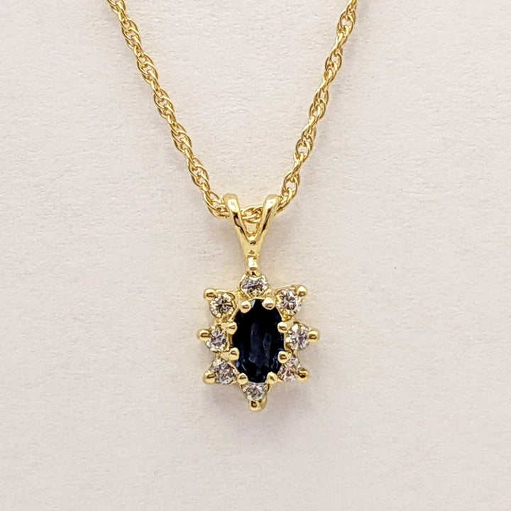 14K SAPPHIRE OVAL 3X5 WITH .12 DIAMOND TOTAL WEIGHT (8) ROUND ESTATE PENDANT & CHAIN 2.1 GRAMS