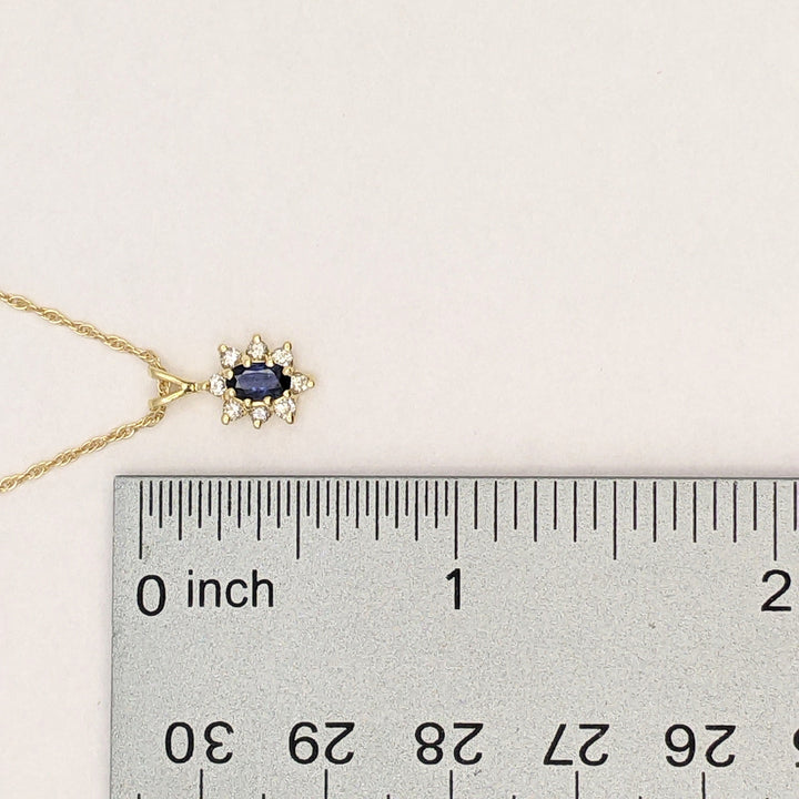 14K SAPPHIRE OVAL 3X5 WITH .12 DIAMOND TOTAL WEIGHT (8) ROUND ESTATE PENDANT & CHAIN 2.1 GRAMS