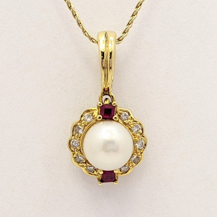 18K PEARL ROUND 7MM WITH .10 DIAMOND TOTAL WEIGHT (10) ROUND AND RUBY (2) PRINCESS CUT ESTATE PENDANT & 14K CHAIN 5.0 GRAMS
