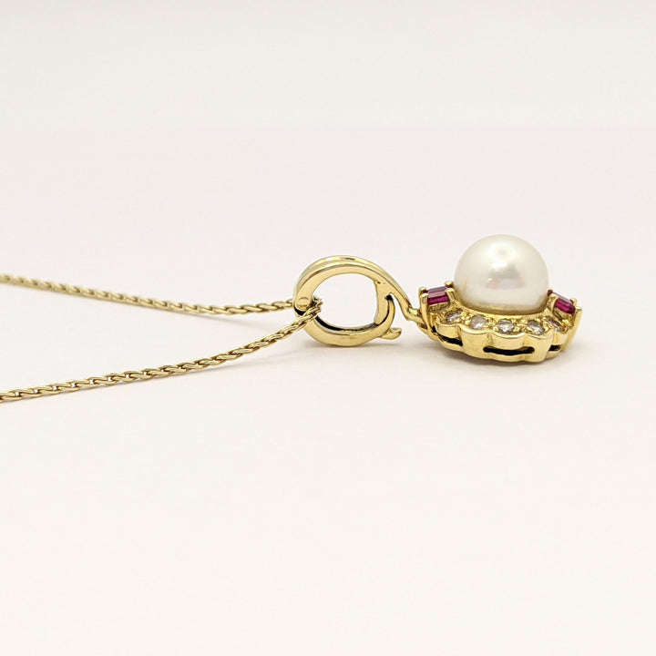 18K PEARL ROUND 7MM WITH .10 DIAMOND TOTAL WEIGHT (10) ROUND AND RUBY (2) PRINCESS CUT ESTATE PENDANT & 14K CHAIN 5.0 GRAMS