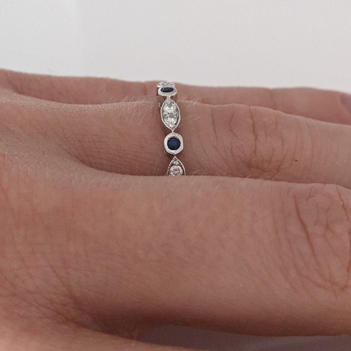 14K WHITE SAPPHIRE ROUND (3) 1.5MM WITH (8) MELEE ESTATE ROUND/ MARQUISE BAND 2.3 GRAMS