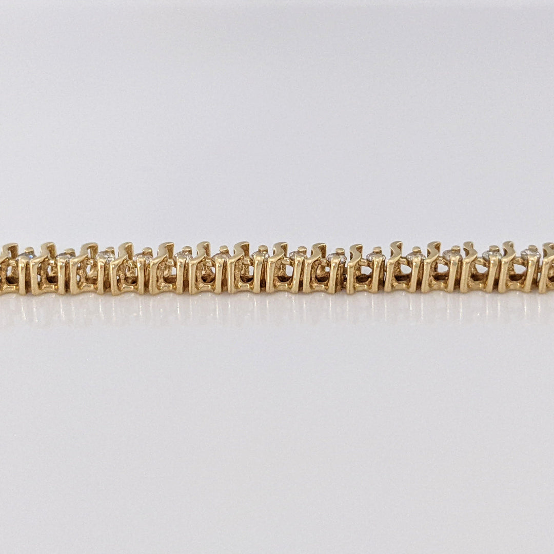 14K .80 CARAT TOTAL WEIGHT I1 I DIAMOND ROUND (64) S- LINK ESTATE BRACELET 7.6 GRAMS