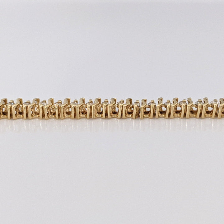 14K .80 CARAT TOTAL WEIGHT I1 I DIAMOND ROUND (64) S- LINK ESTATE BRACELET 7.6 GRAMS