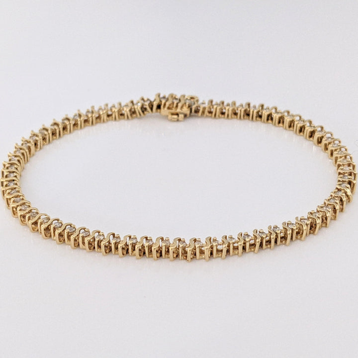 14K .80 CARAT TOTAL WEIGHT I1 I DIAMOND ROUND (64) S- LINK ESTATE BRACELET 7.6 GRAMS