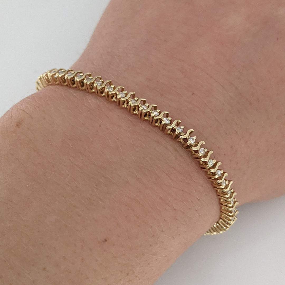 14K .80 CARAT TOTAL WEIGHT I1 I DIAMOND ROUND (64) S- LINK ESTATE BRACELET 7.6 GRAMS