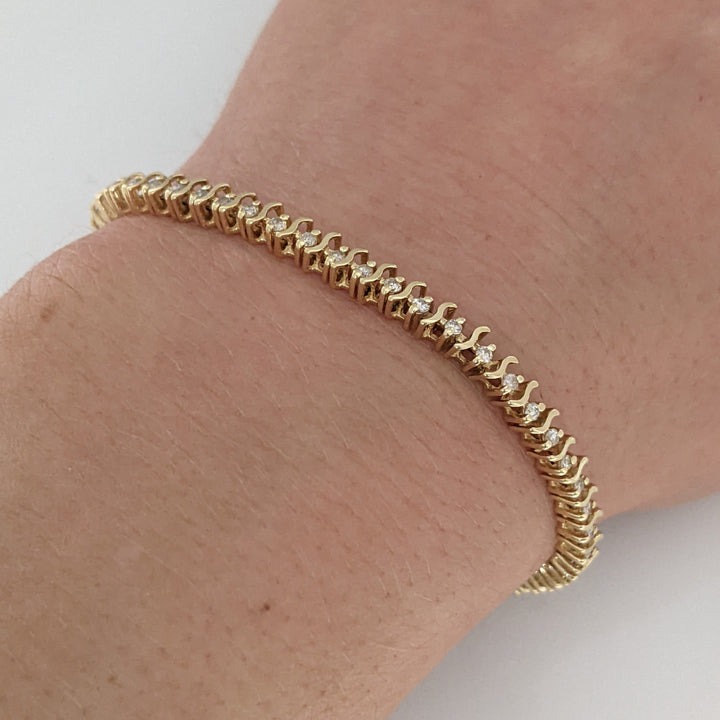 14K .80 CARAT TOTAL WEIGHT I1 I DIAMOND ROUND (64) S- LINK ESTATE BRACELET 7.6 GRAMS