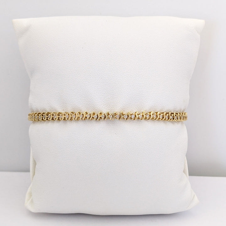 14K .80 CARAT TOTAL WEIGHT I1 I DIAMOND ROUND (64) S- LINK ESTATE BRACELET 7.6 GRAMS