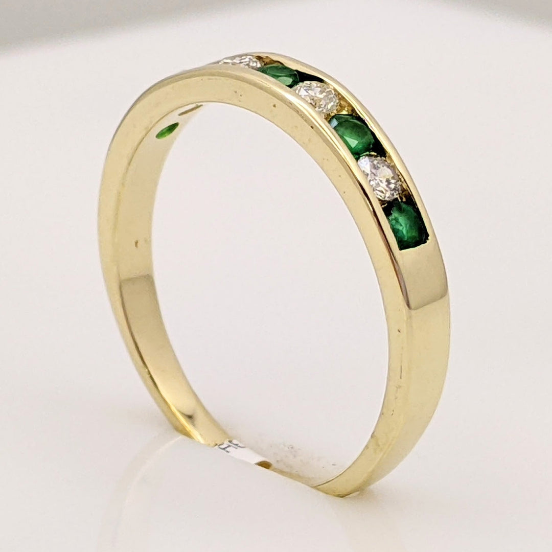 14K EMERALD ROUND (5) 2MM WITH .12 DIAMOND TOTAL WEIGHT (4) ROUND ESTATE CHANNEL BAND 2.0 GRAMS