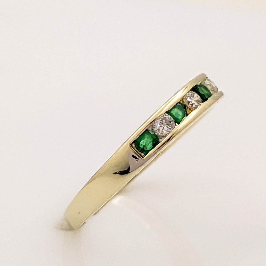 14K EMERALD ROUND (5) 2MM WITH .12 DIAMOND TOTAL WEIGHT (4) ROUND ESTATE CHANNEL BAND 2.0 GRAMS