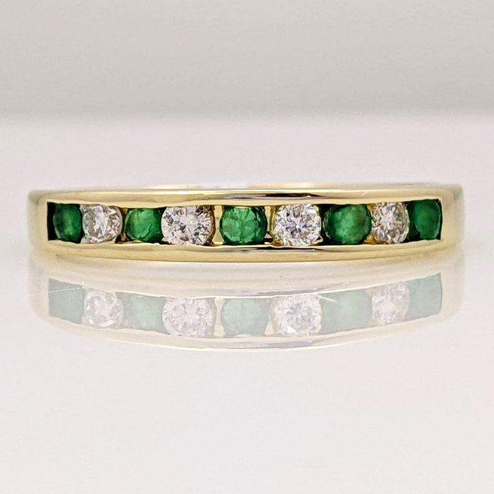 14K EMERALD ROUND (5) 2MM WITH .12 DIAMOND TOTAL WEIGHT (4) ROUND ESTATE CHANNEL BAND 2.0 GRAMS