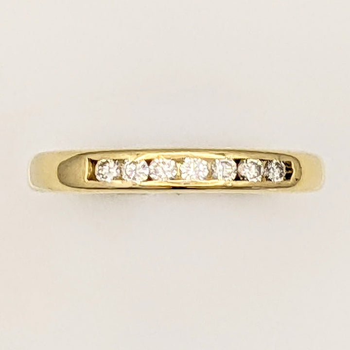 14K .21 CARAT TOTAL WEIGHT SI2 H DIAMOND ROUND (7) ESTATE CHANNEL BAND 2.5 GRAMS