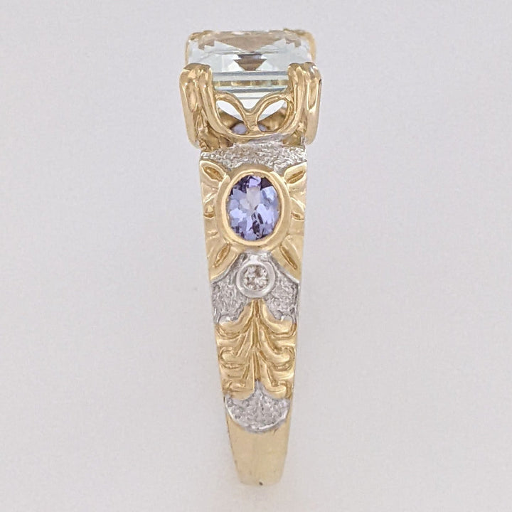 14K AQUAMARINE EMERALD CUT 7X9 WITH (2) OVAL TANZANITE WITH MELEE ESTATE RING 3.6 GRAMS
