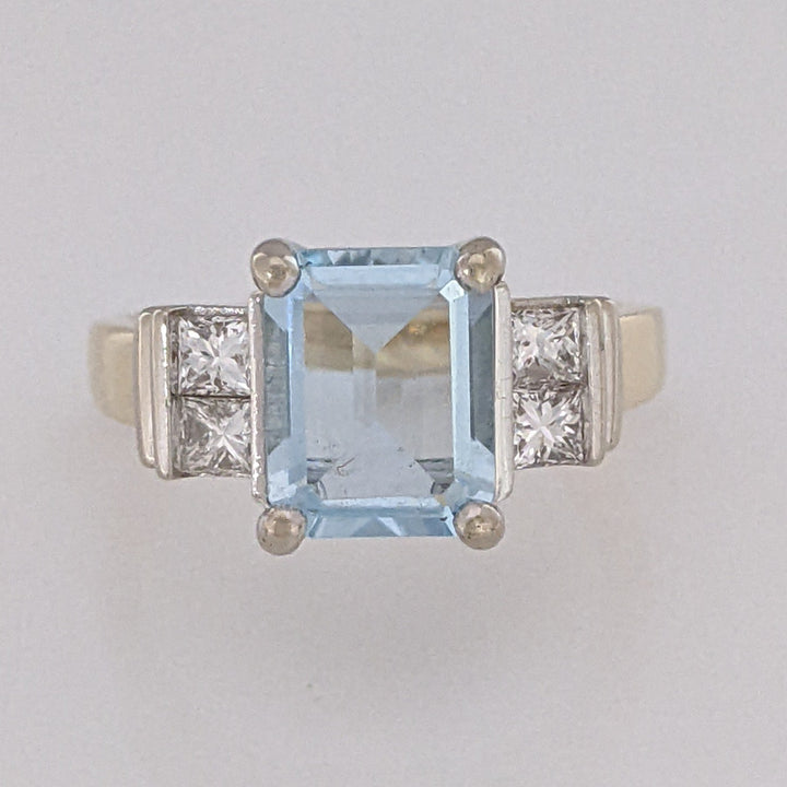 14K TWO-TONE AQUAMARINE EMERALD CUT 7X9 WITH .72 DIAMOND TOTAL WEIGHT (4) PRINCESS CUT ESTATE RING 6.2 GRAMS