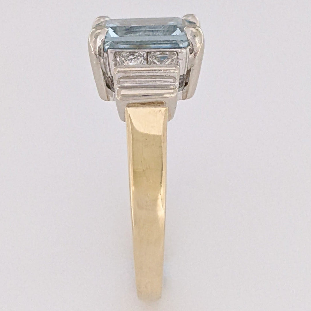 14K TWO-TONE AQUAMARINE EMERALD CUT 7X9 WITH .72 DIAMOND TOTAL WEIGHT (4) PRINCESS CUT ESTATE RING 6.2 GRAMS