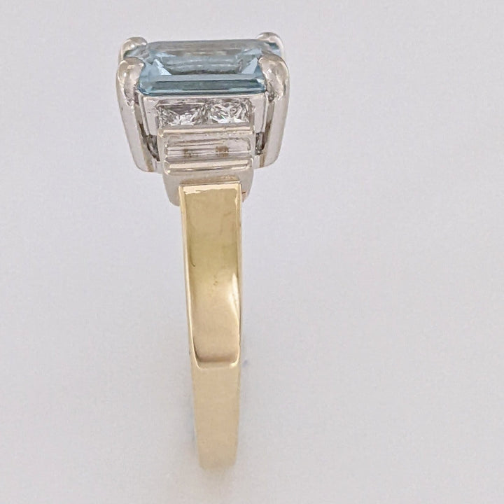 14K TWO-TONE AQUAMARINE EMERALD CUT 7X9 WITH .72 DIAMOND TOTAL WEIGHT (4) PRINCESS CUT ESTATE RING 6.2 GRAMS