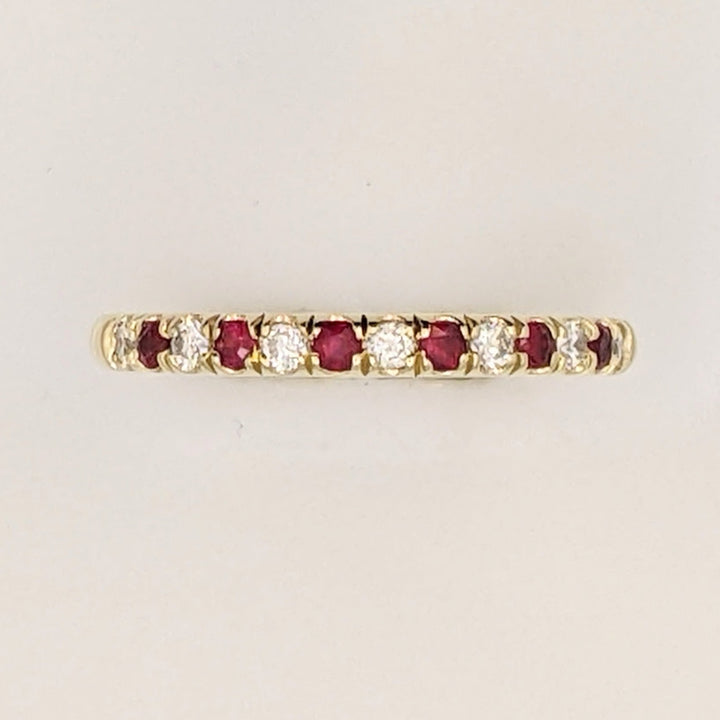 14K RUBY ROUND (6) WITH .17 DIAMOND TOTAL WEIGHT (7) ROUND ESTATE BAND 2.7 GRAMS