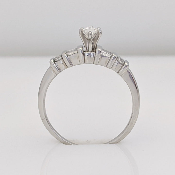 PLATINUM .41 CARAT TOTAL WEIGHT I1 F DIAMOND (1) MARQUISE CUT WITH (4) BAGUETTE CUT (2) ROUND ESTATE RING 4.0 GRAMS